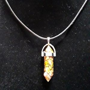 RESIN CRYSTAL WITH GREEN AND BROWN CHIPS/CORD NEW